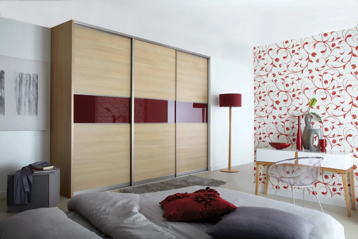 Modern sliding fitted wardrobes with bespoke bedroom storage installed in Eastbourne.