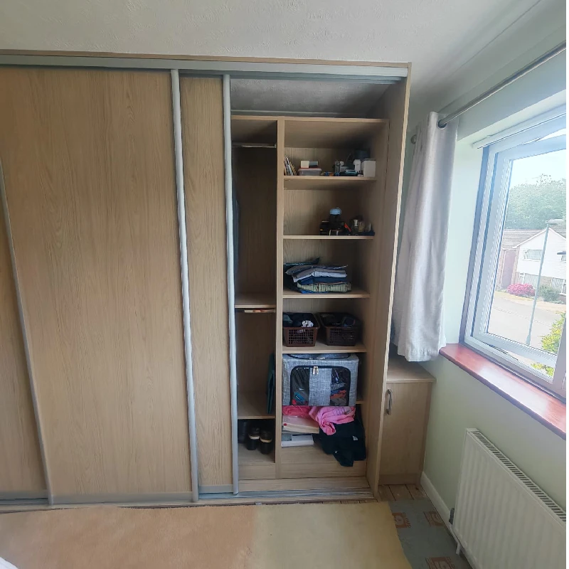 Custom wardrobe interior with double hanging rails and shelving in Hailsham, East Sussex