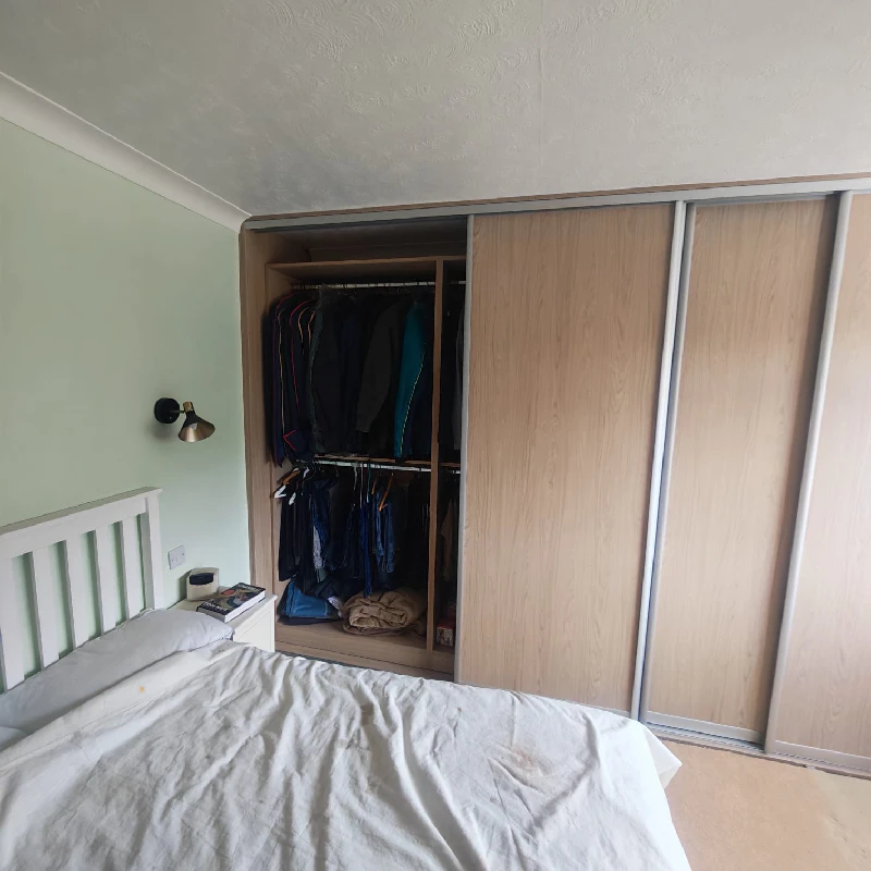 Custom wardrobe interior with double hanging rails and shelving in Hailsham, East Sussex